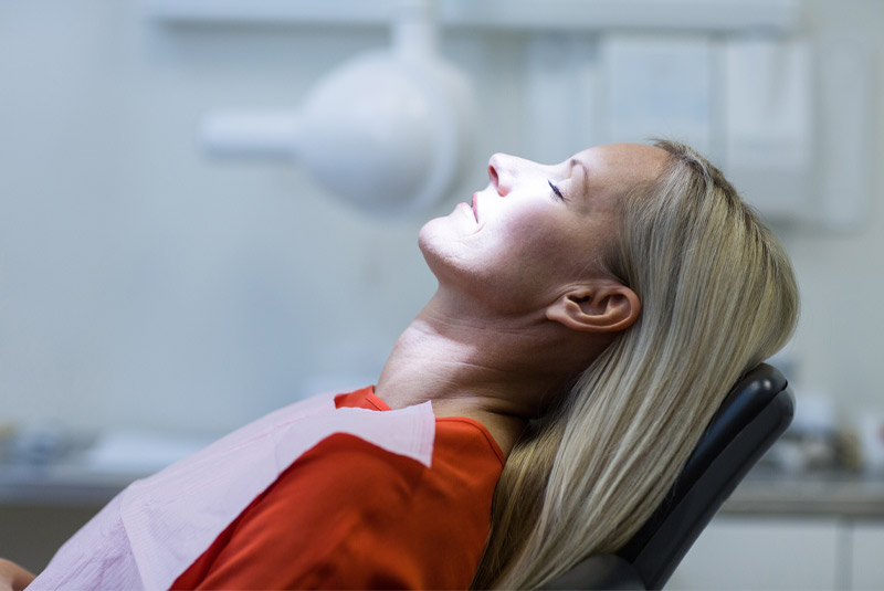 Nice lady in dental chair sleeping