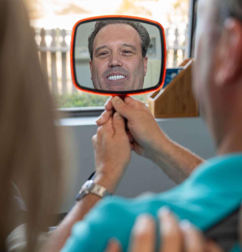 patient smiling brightly after their dental procedure